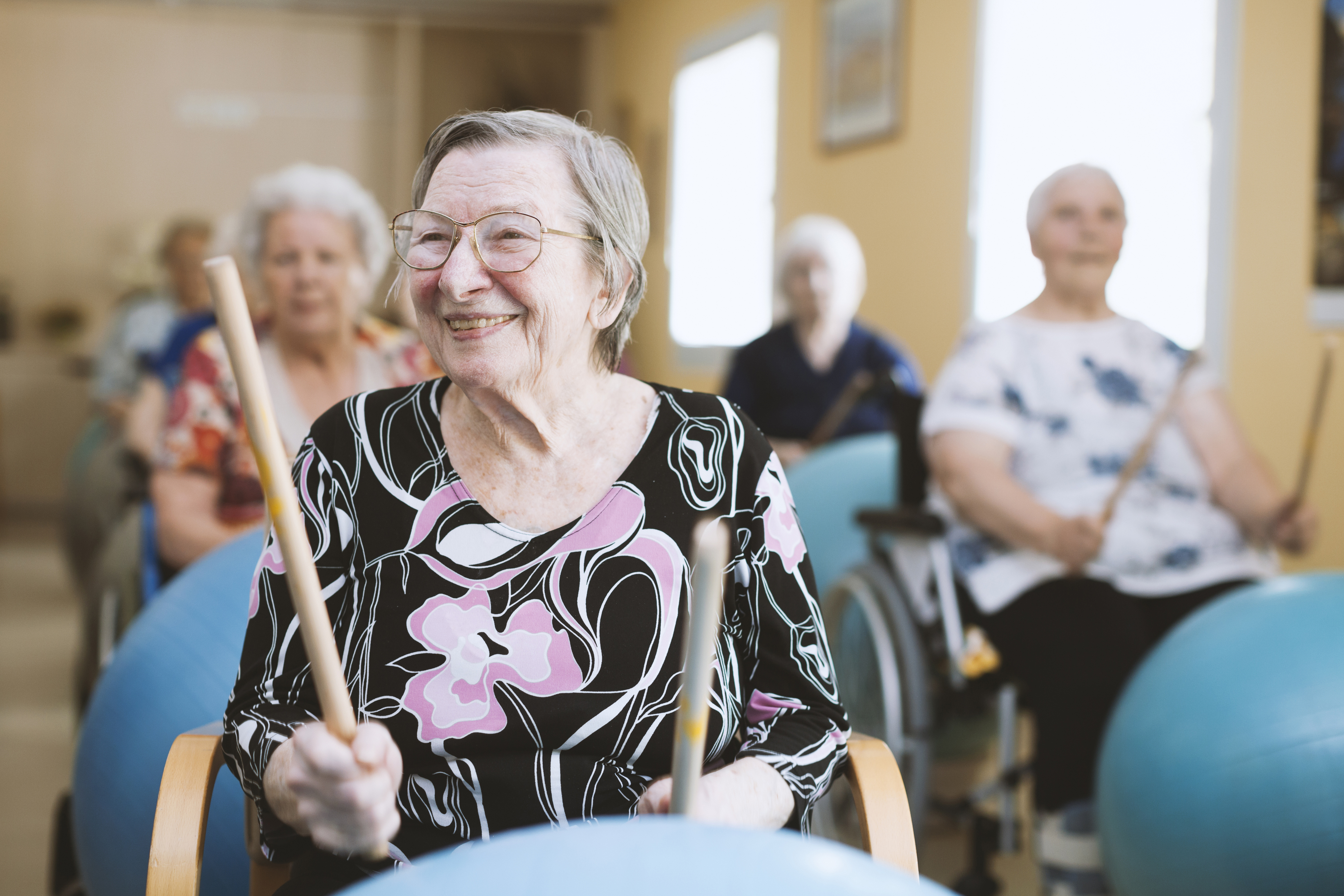 group of seniors taking part in fitness activity