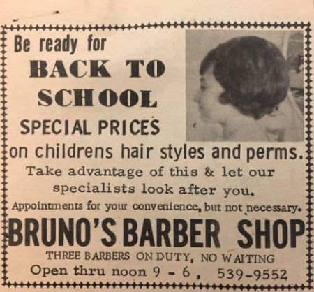 Barbershop ad with a woman modeling a haircut.