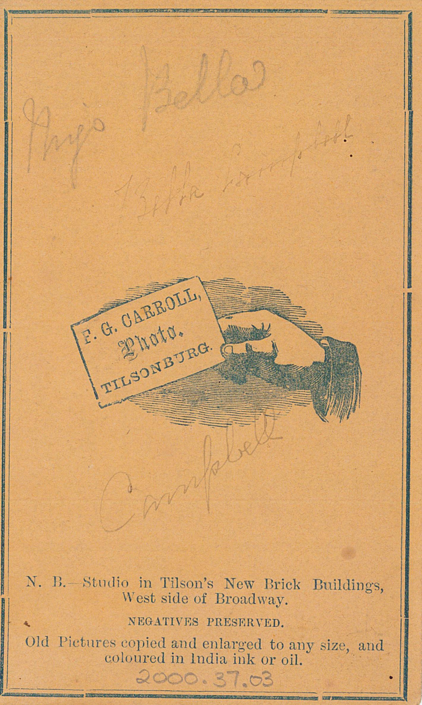 Back of orange cabinet card from F.G. Carroll's photography studio. Feature a sketch of a hand holding a card. "Studio in Tillson's new brick buildings, west side of Broadway. Negatives preserved. Pictures copied and enlarged to any size, and coloured in India ink or oil."